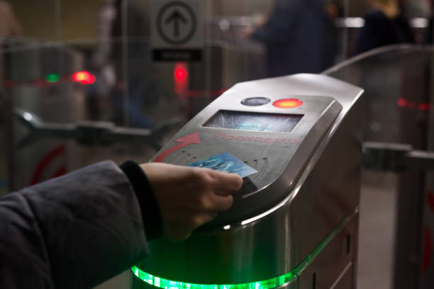 istock A woman’s hand applies a ticket to a sensor of an automatic subway system in Moscow. Translation: pass. 1286352095