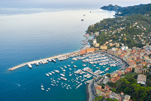 Panoramic view of a harbor in Ligurian Sea, Santa Margherita Ligure, Italy. Colorful houses on a seashore.