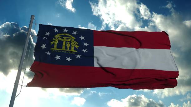 istock Georgia flag on a flagpole waving in the wind in the sky. 3d rendering 1286355216