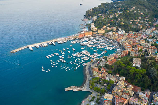 Panoramic view of a harbor in Ligurian Sea, Santa Margherita Ligure, Italy. Colorful houses on a seashore Panoramic view of a harbor in Ligurian Sea, Santa Margherita Ligure, Italy. Colorful houses on a seashore. santa margherita ligure italy stock pictures, royalty-free photos & images