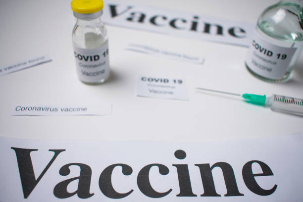 istock coronavirus vaccine and syringe injection 1286357623