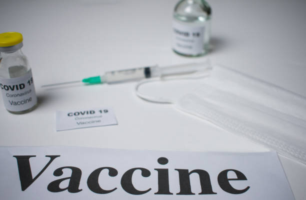 istock coronavirus vaccine and syringe injection 1286357729