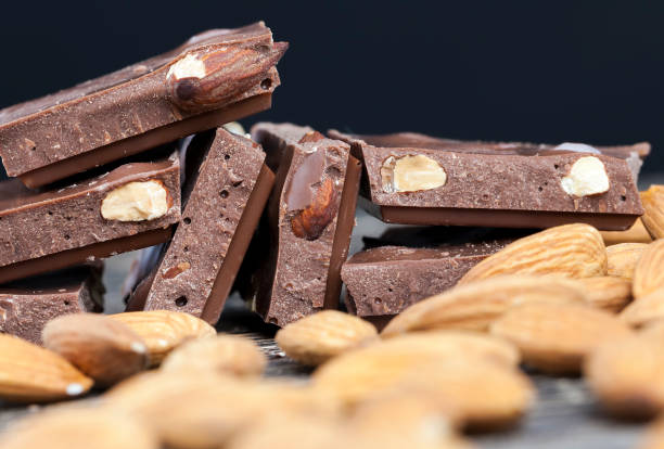 istock almonds and chocolate mixed in sweet chocolate 1286357925