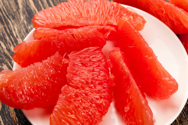 istock slices of delicious red grapefruit 1286359390