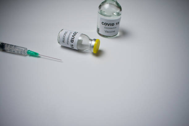istock coronavirus vaccine and syringe injection 1286359477
