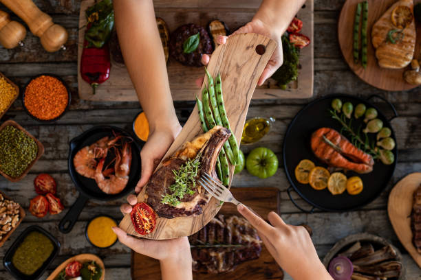 istock Different kinds of grilled meat on the table at the restaurant. 1286362229