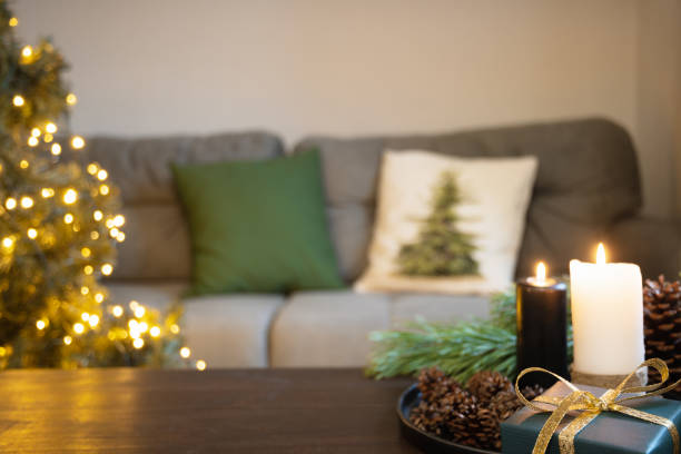 istock Blurred home interior in living room with Christmas tree. 1286362487