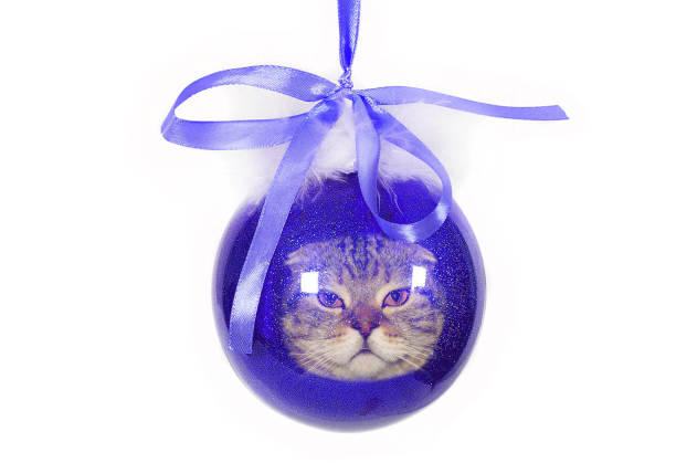 Christmas decoration on Christmas tree. Christmas tree at home. Christmas in apartment. Details of holiday.