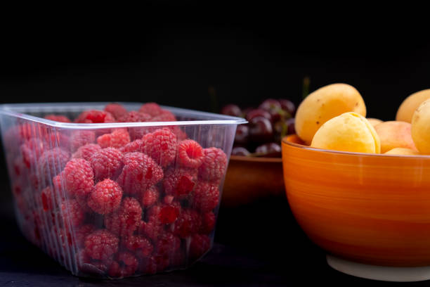 grape berries lie on a dark background in the kitchen