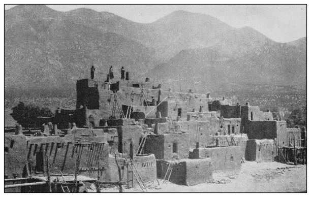 Antique black and white photo of the United States: Pueblo of Taos, New Mexico Antique black and white photo of the United States: Pueblo of Taos, New Mexico taos pueblo stock illustrations