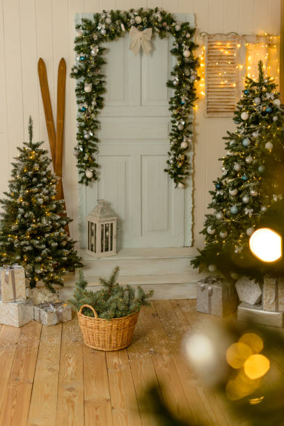 istock Beautiful holdiay decorated room with Christmas tree with presents under it 1286368954