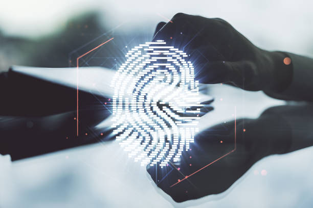 istock Double exposure of abstract creative fingerprint hologram with finger clicks on a digital tablet on background, research and development concept 1286369680
