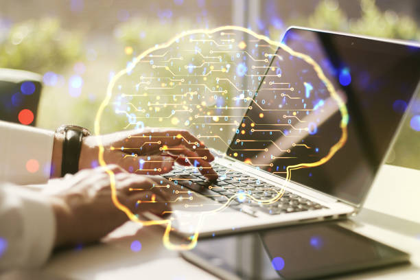 istock Double exposure of creative human brain microcircuit with hand typing on computer keyboard on background. Future technology and AI concept 1286369914