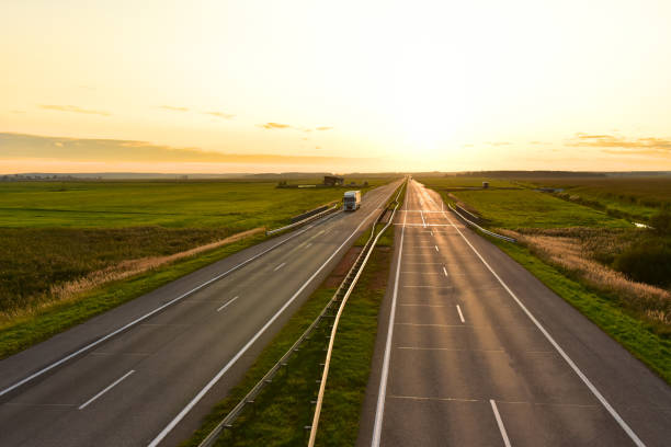 istock Truck with semi-trailer driving along highway 1286373246