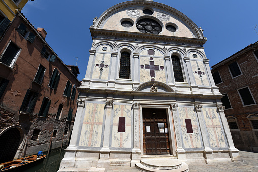 The church Santa Maria dei Miracoli in Venice (Italy) captured on a beatiful sunny day in summer. The church (also known as the marble church) is located at in the sestiere of Cannaregio. The building was completed in 1489.