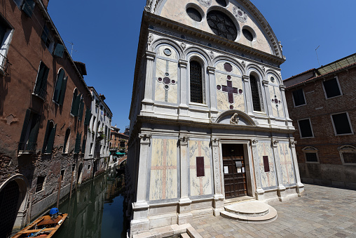 The church Santa Maria dei Miracoli in Venice (Italy) captured on a beatiful sunny day in summer. The church (also known as the marble church) is located at in the sestiere of Cannaregio. The building was completed in 1489.