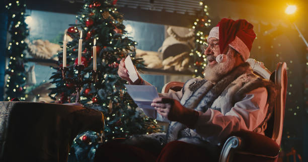 istock Santa Claus discussing letters with camera 1286376766
