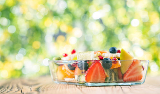 istock Portion fruit salad in a bowl . Healthy meal 1286377957