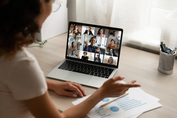 istock Woman worker speak on group video call on computer 1286380725