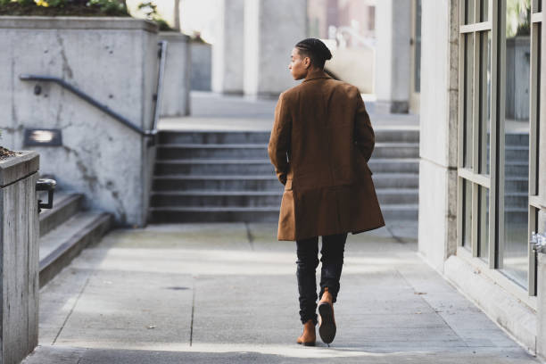 istock African American woman walking alone 1286384859