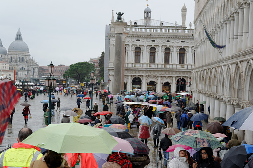 Venice, Italy, February 27, 2014: umbrellas at the Bridge of Sighs
