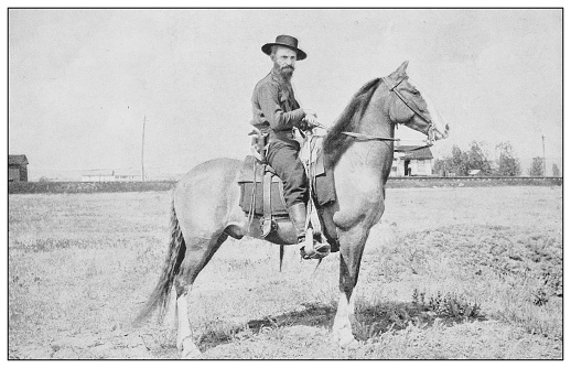 Antique black and white photo of the United States: Real cowboy