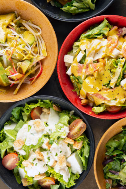 istock Salads on colorful bowls, top view 1286386568