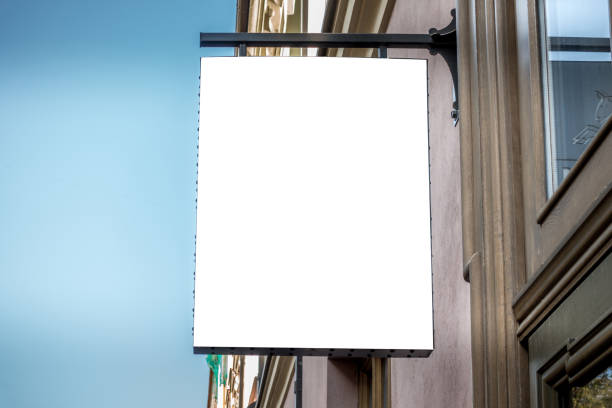 istock Mock up. Blank white signboard on the wall of classical architecture building 1286387800