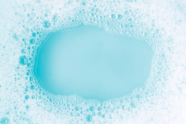 istock Soap suds on a blue water bachground 1286387824