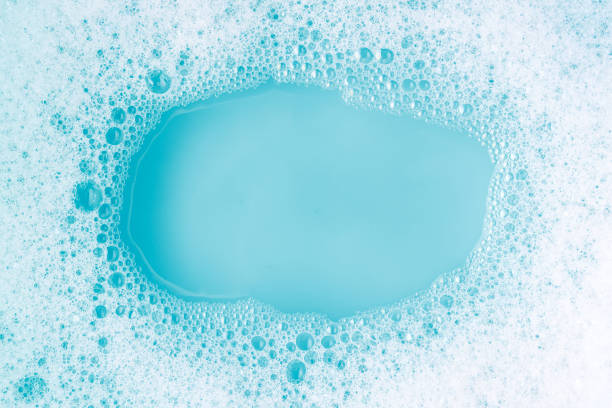 istock Soap suds on a blue water bachground 1286387970
