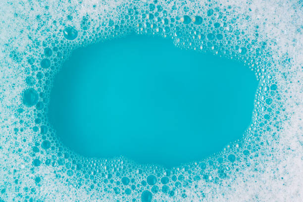 Soap suds on a blue water bachground