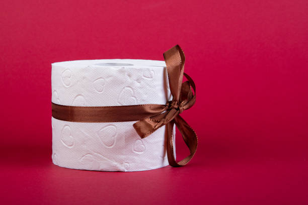 istock toilet paper roll with loop as present on red background 1286391533