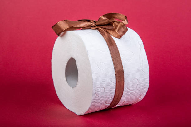 istock toilet paper roll with loop as present on red background 1286391589