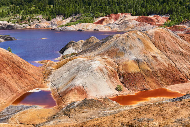 istock purple lake in old kaolin quarry 1286393306