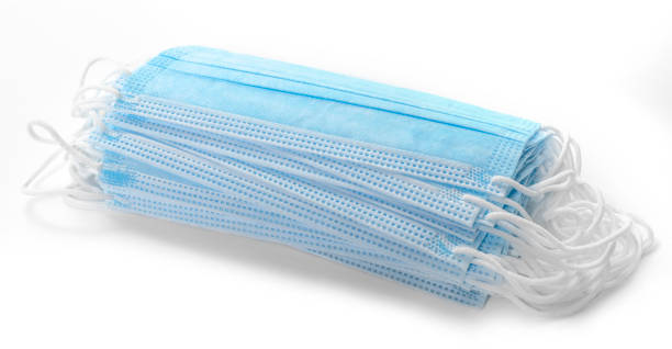 istock medical face mask with white rope strap for protective coronavirus COVID-19 1286394145