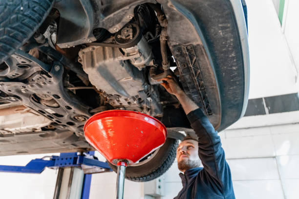 istock Auto Repair Garage with Mechanic 1286398715