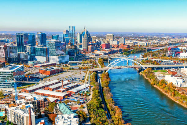 Nashville, Tennesee Aerial The skyline of beautiful Nashville, Tennessee, known as "Music City" along the banks of the Cumberland River. nashville tennessee bridge stock pictures, royalty-free photos & images
