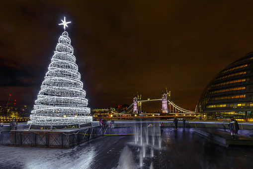 Illuminated Christmas Tree and London Tower Bridge, UK, England