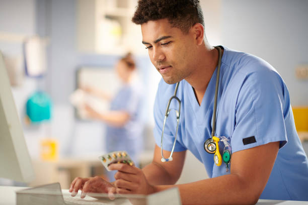 istock junior doctor checking patient's meds 1286402343