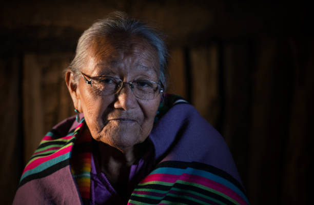 smiling navajo senior woman portrait with traditional clothes - native american north american tribal culture women mature adult imagens e fotografias de stock