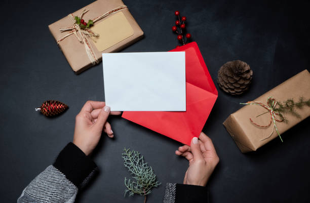 istock Female hands preparing gift boxes for Christmas and Valentine's Day 1286404077