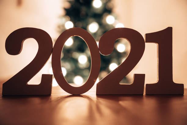 istock 2021 new year text on plank wood 1286408331