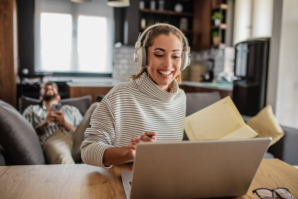 istock Young woman is working from home on laptop 1286409643
