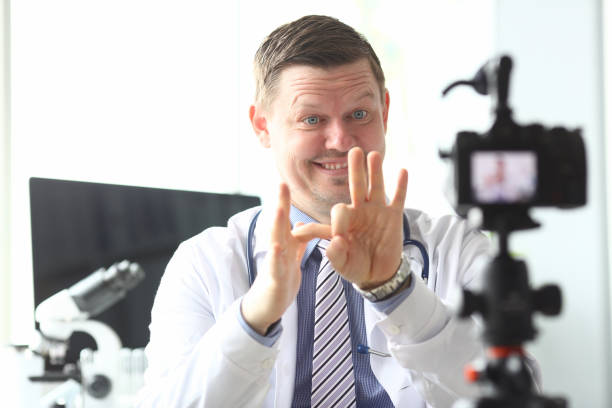 istock Blogger in white medical gown 1286411537