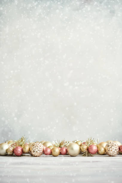 istock Christmas Background with Pink and Gold Decorations on White Wood 1286431502