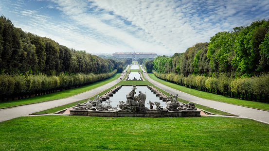 Caserta, Campania / Italy - April 26, 2013:  The gardens of the Caserta Palace, a UNESCO World Heritage Site from the 18th century.