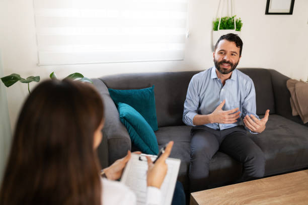 istock Adult man with depression talking about his recovery 1286437019