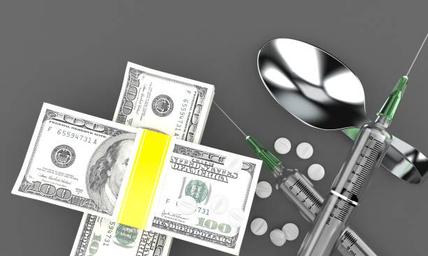 istock Dollar currency with drugs 1286445605