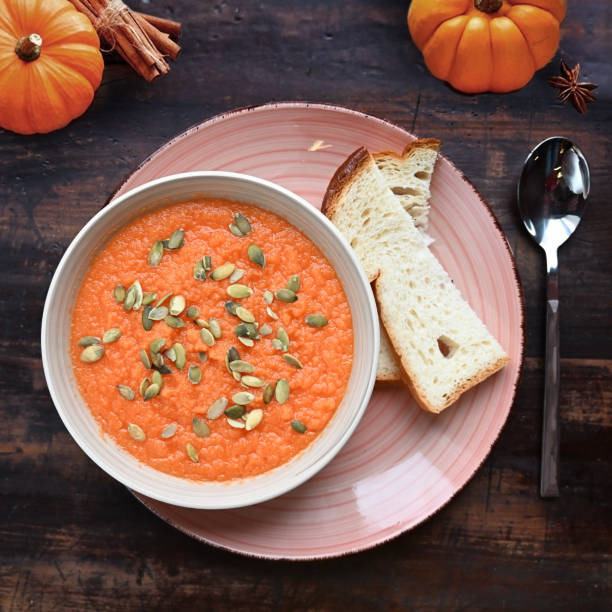 istock Vegetarian dish pumpkin soup with pumpkin seeds 1286448054