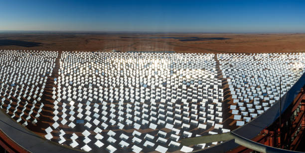 Panoramic view of solar energy generation plant in South African desert A high panorama of heliostats at the Khi Solar One solar energy generation plant in the desert near Keimoes and Upington in the Northern Cape, South Africa. heliostat photos stock pictures, royalty-free photos & images